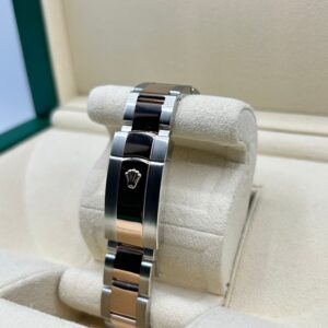 Pre-owned moonphase wrist watch with dark dial
