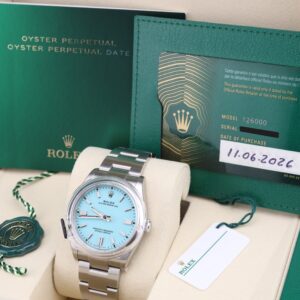 Pre-owned automatic dress watch with turquoise dial