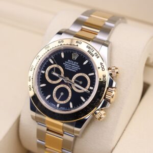 Side angle of two-tone automatic chronograph watch