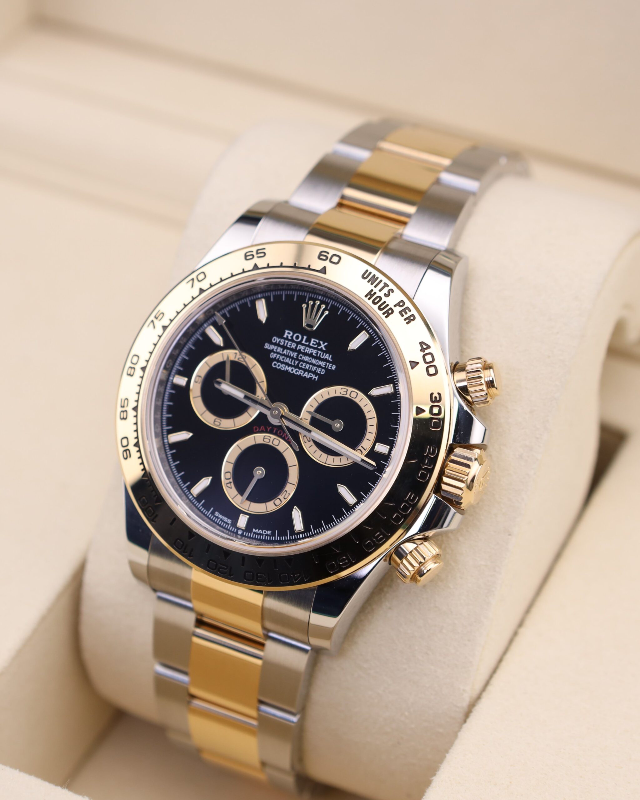 Side angle of two-tone automatic chronograph watch