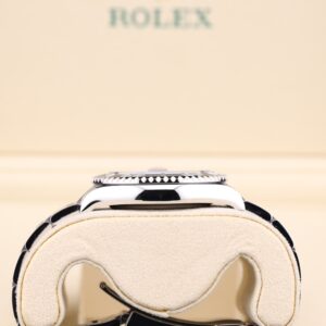 Luxury watch with blue dial and metal bracelet
