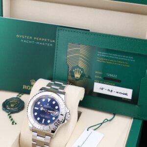 Blue dial watch on wrist
