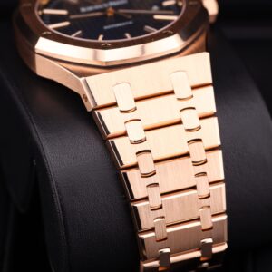 Close-up of blue dial rose gold watch