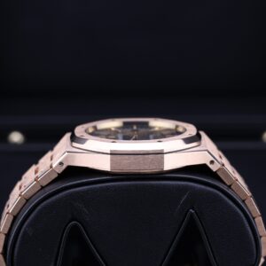 Rose gold watch crown and blue dial detail