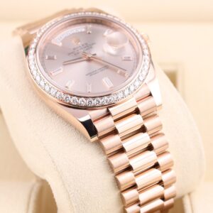 Pink dial ladies luxury watch with diamond accents