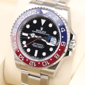 Pre-owned two-tone automatic watch with blue and red bezel