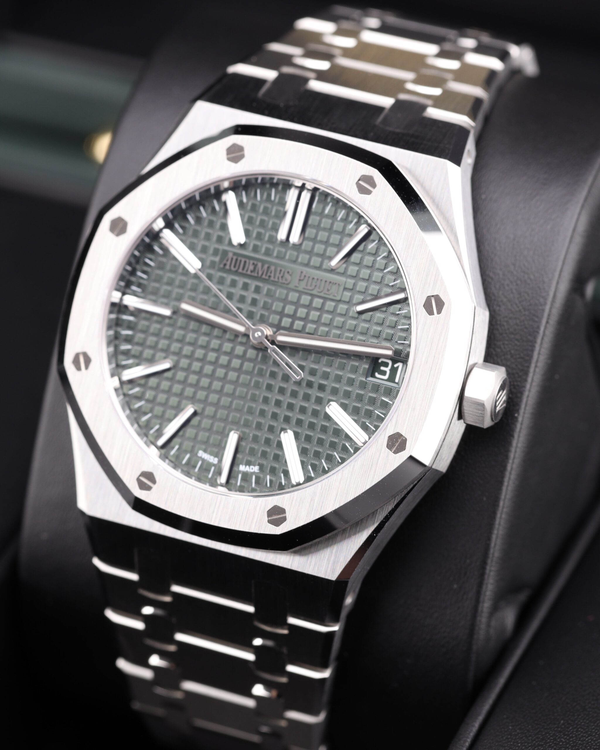 Pre-owned moonphase wrist watch with dark dial