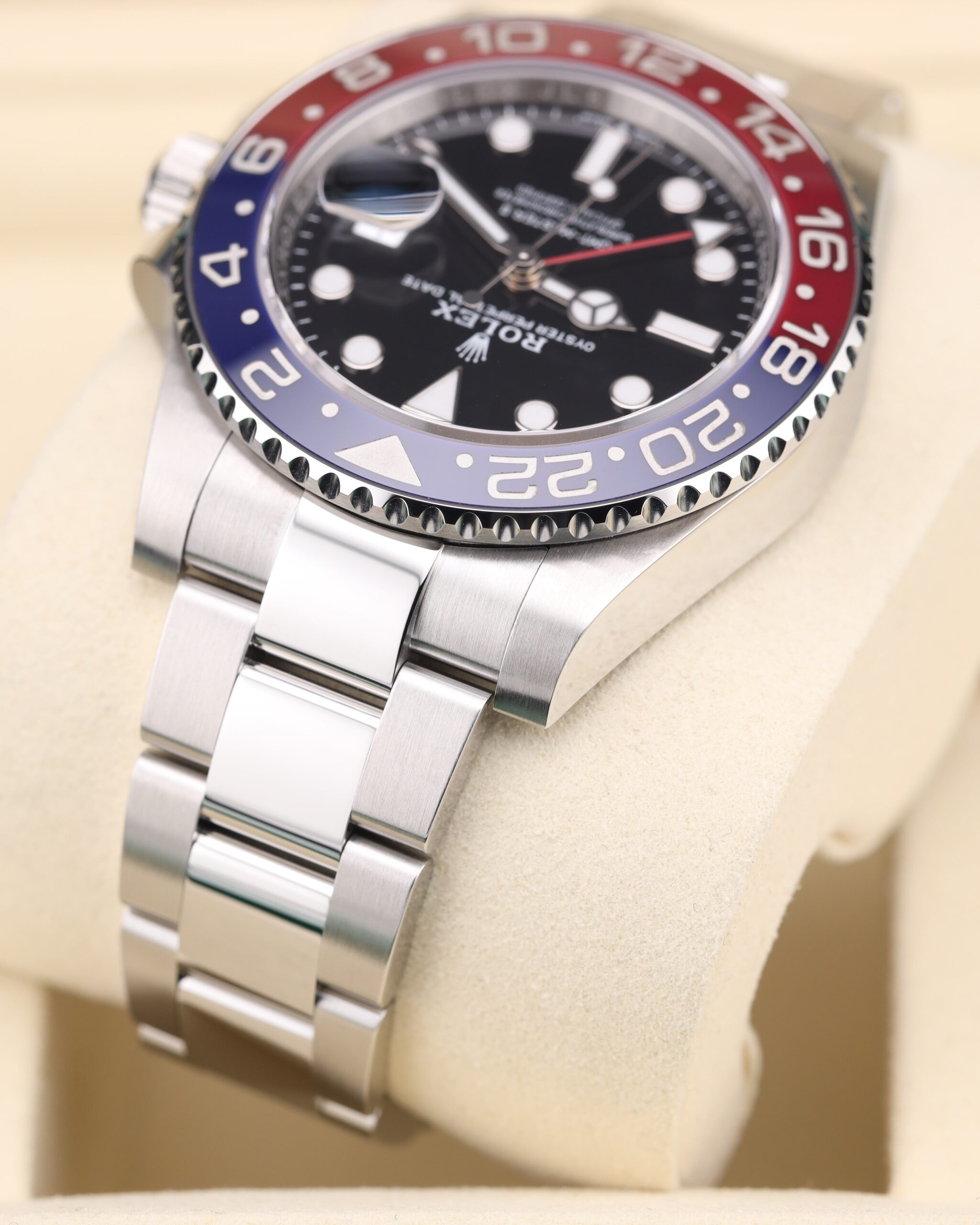 Pre-owned stainless steel watch with bold bezel colors