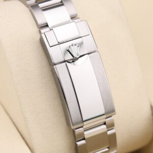 Pre-owned sport luxury timepiece with blue and red bezel