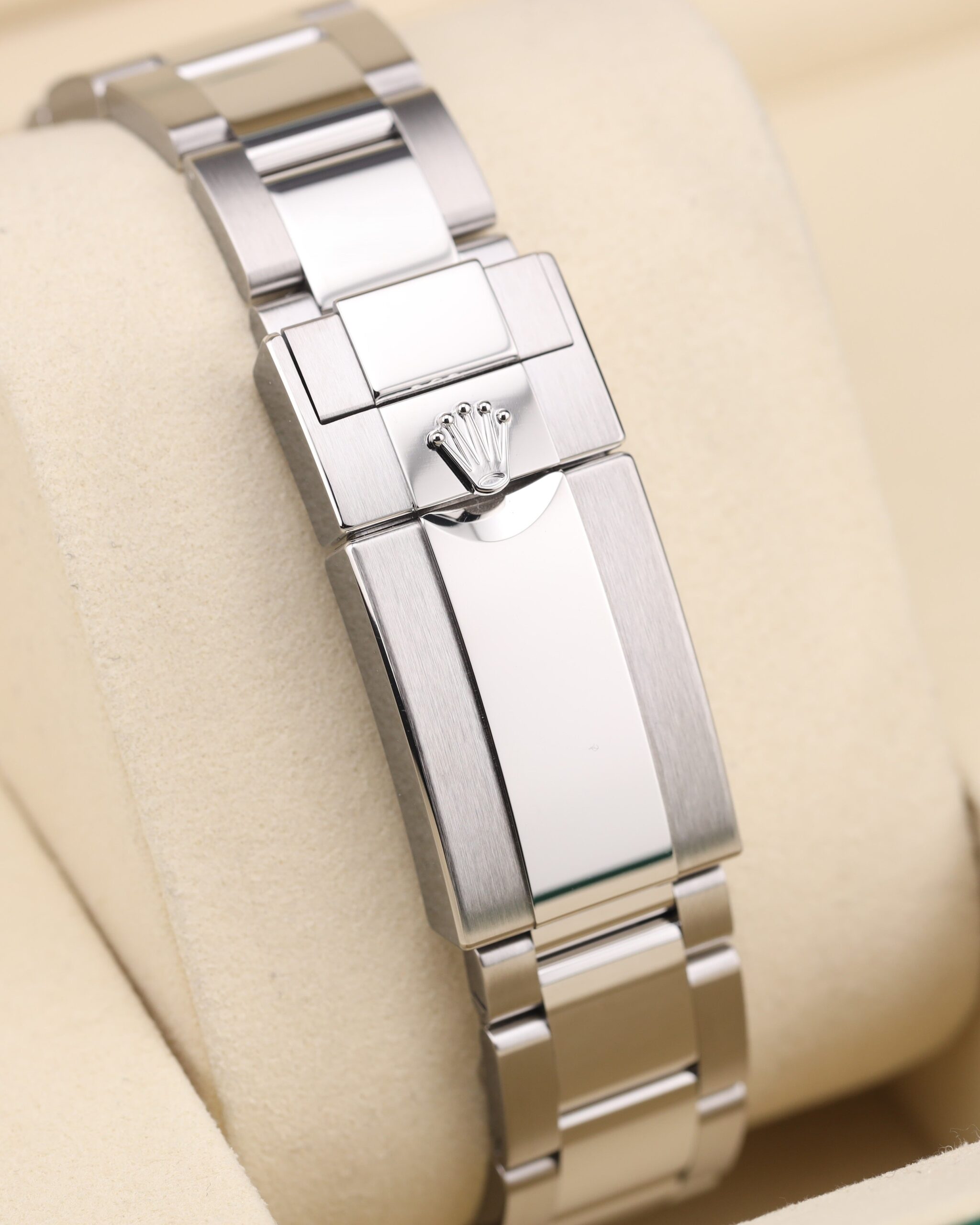 Pre-owned sport luxury timepiece with blue and red bezel