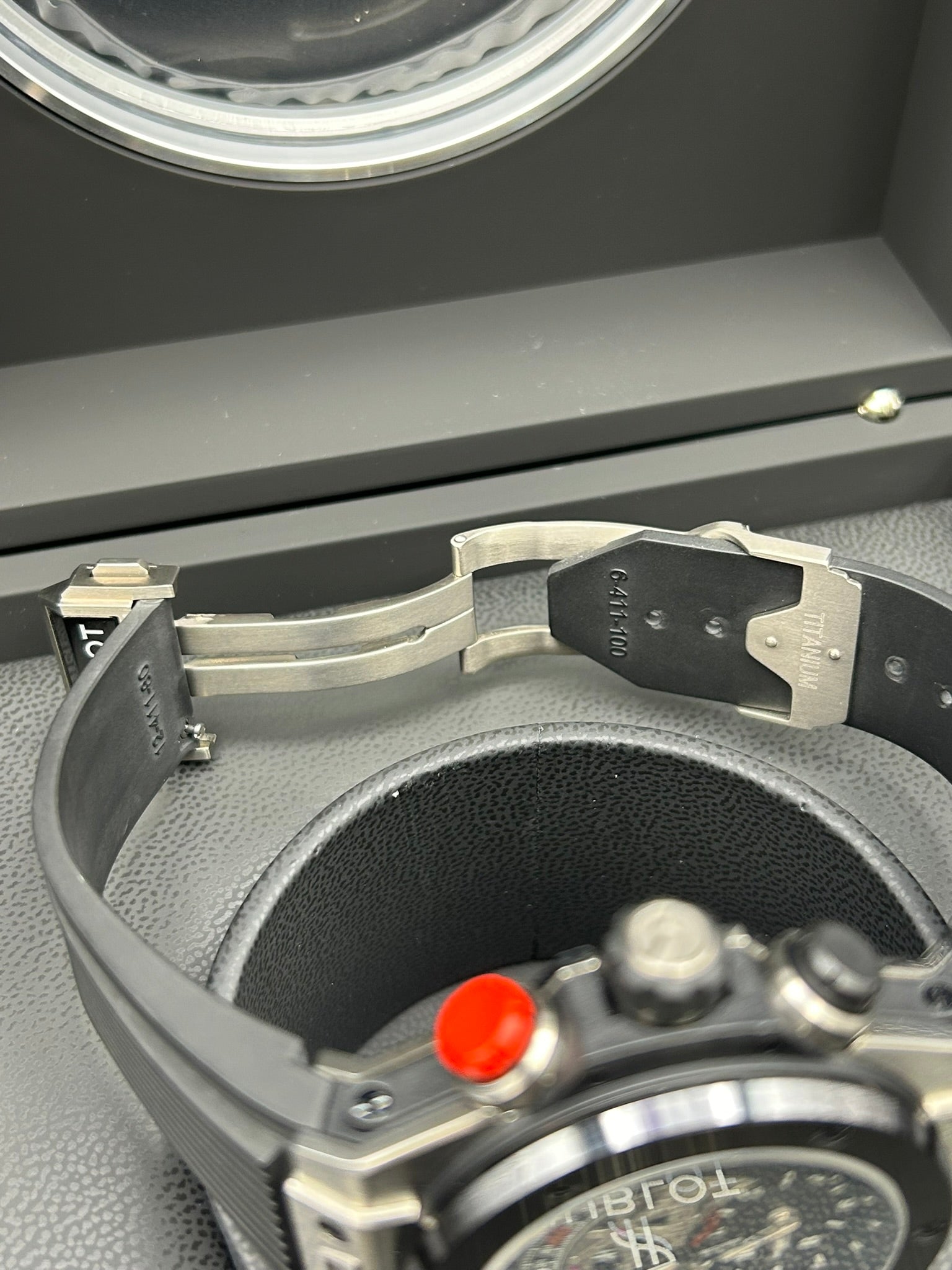 Luxury watch crown and bezel close-up