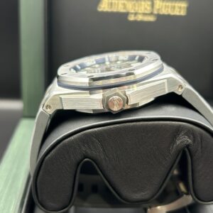 Pre-owned moonphase wrist watch with dark dial