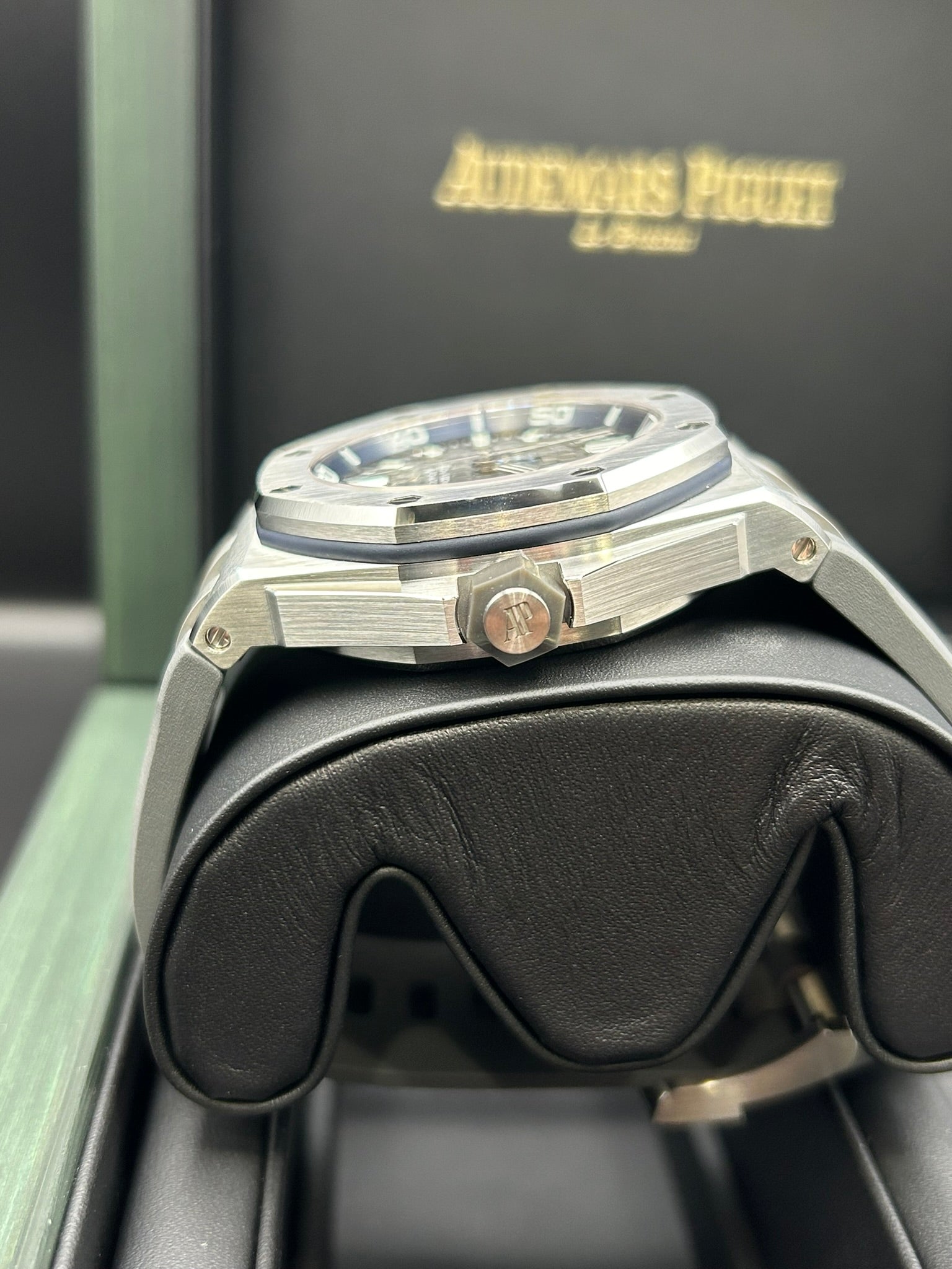Pre-owned moonphase wrist watch with dark dial