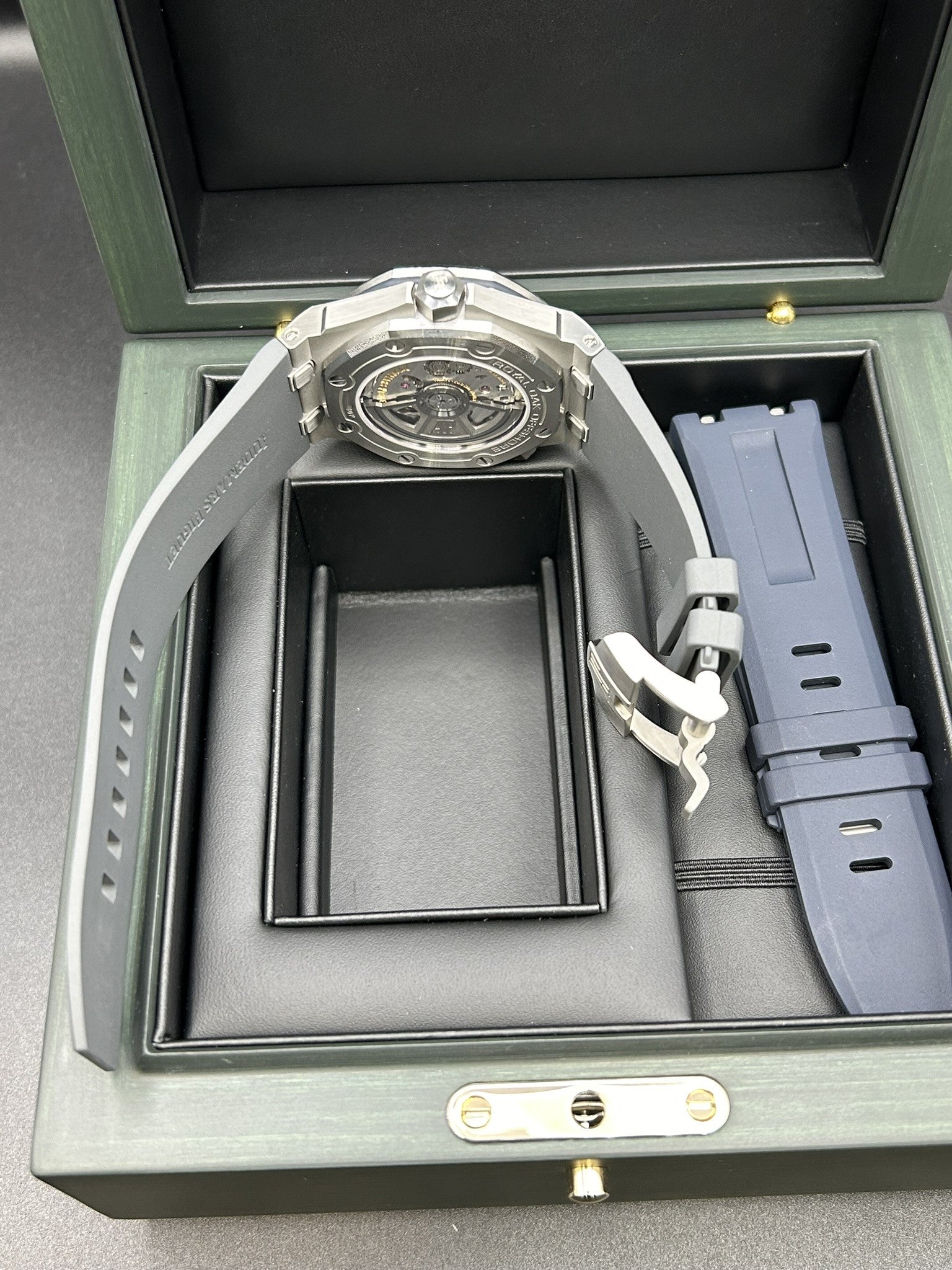 Pre-owned moonphase wrist watch with dark dial