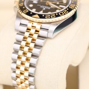 Pre-owned stainless steel chronograph watch close-up