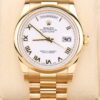 Yellow gold dress watch with white Roman dial