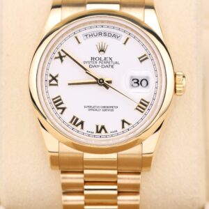 Yellow gold dress watch with white Roman dial