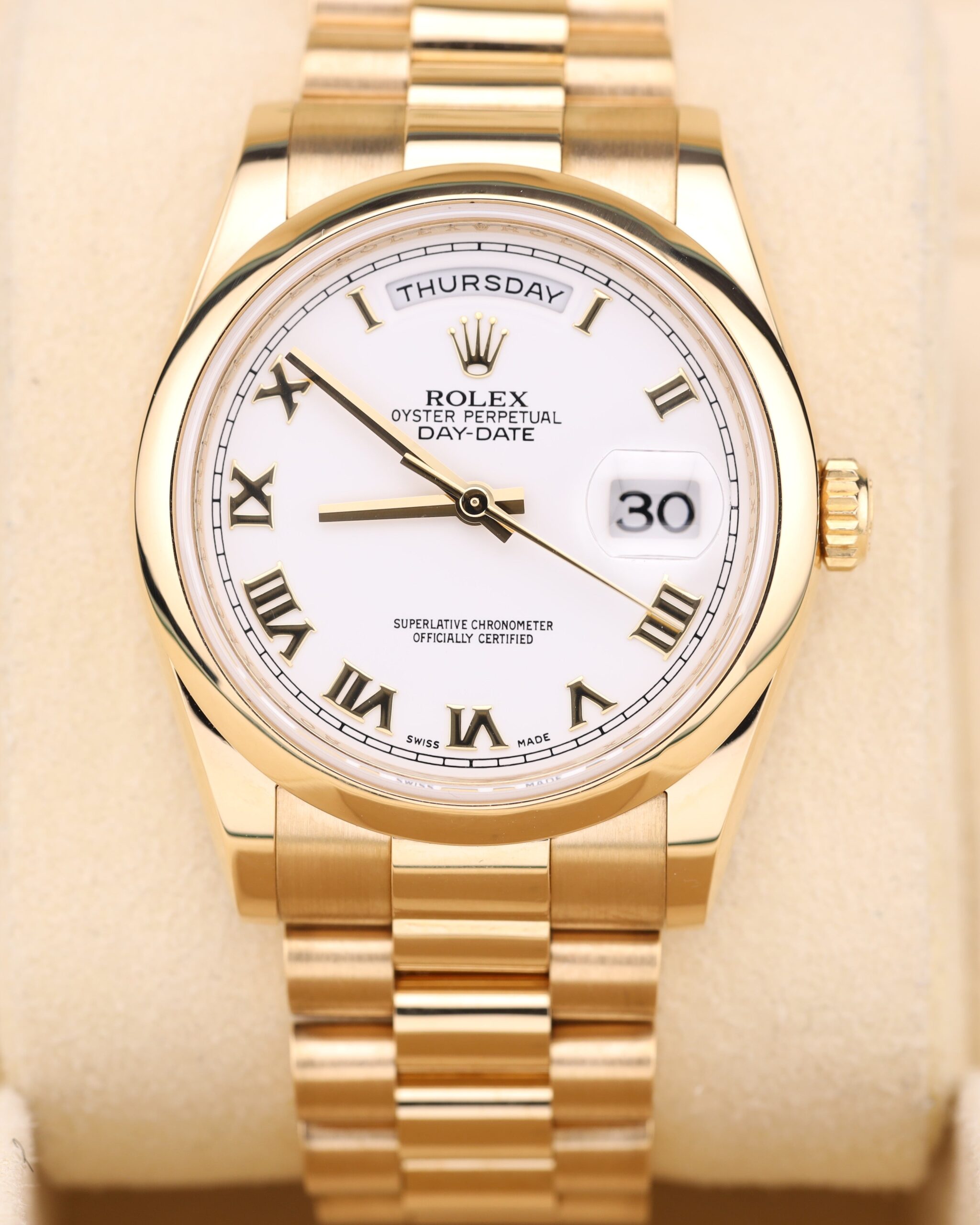 Yellow gold dress watch with white Roman dial