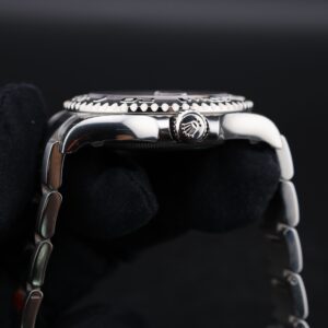 Pre-owned moonphase wrist watch with dark dial