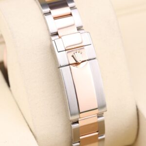 Pre-owned moonphase wrist watch with dark dial