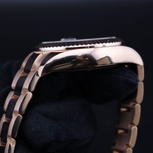 Pre-owned stainless steel chronograph watch close-up