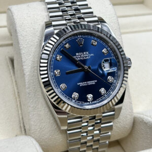 Blue dial watch with diamond hour markers and jubilee bracelet