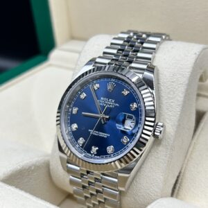 Classic luxury watch with silver dial and metal bracelet