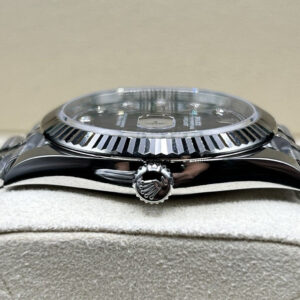Close-up of blue dial dress watch with diamond indices