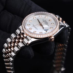Elegant watch with mother of pearl dial and diamond markers