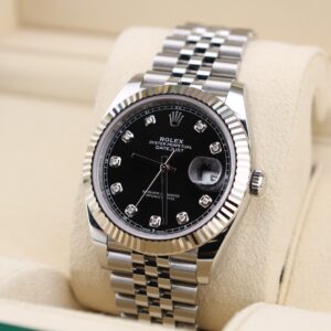 Black dial watch with diamond hour markers