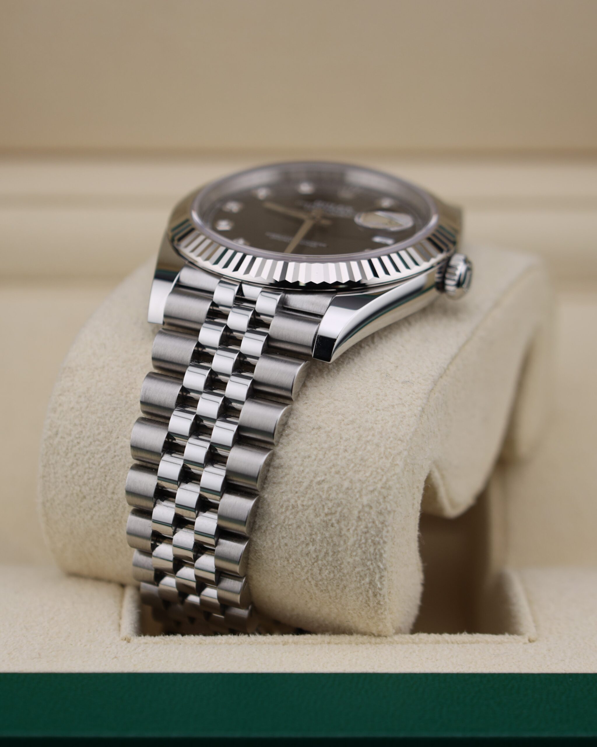 Side angle of black diamond dial wristwatch