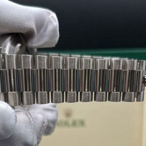 Luxury watch with meteorite dial and baguette markers