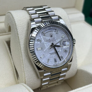 Side view of luxury watch with baguette dial