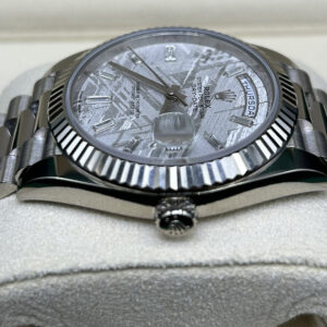 Side view of luxury watch with meteorite dial