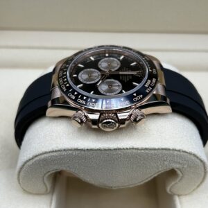 Rose gold watch with black chronograph face