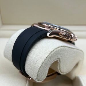 Rose gold chronograph watch with black dial