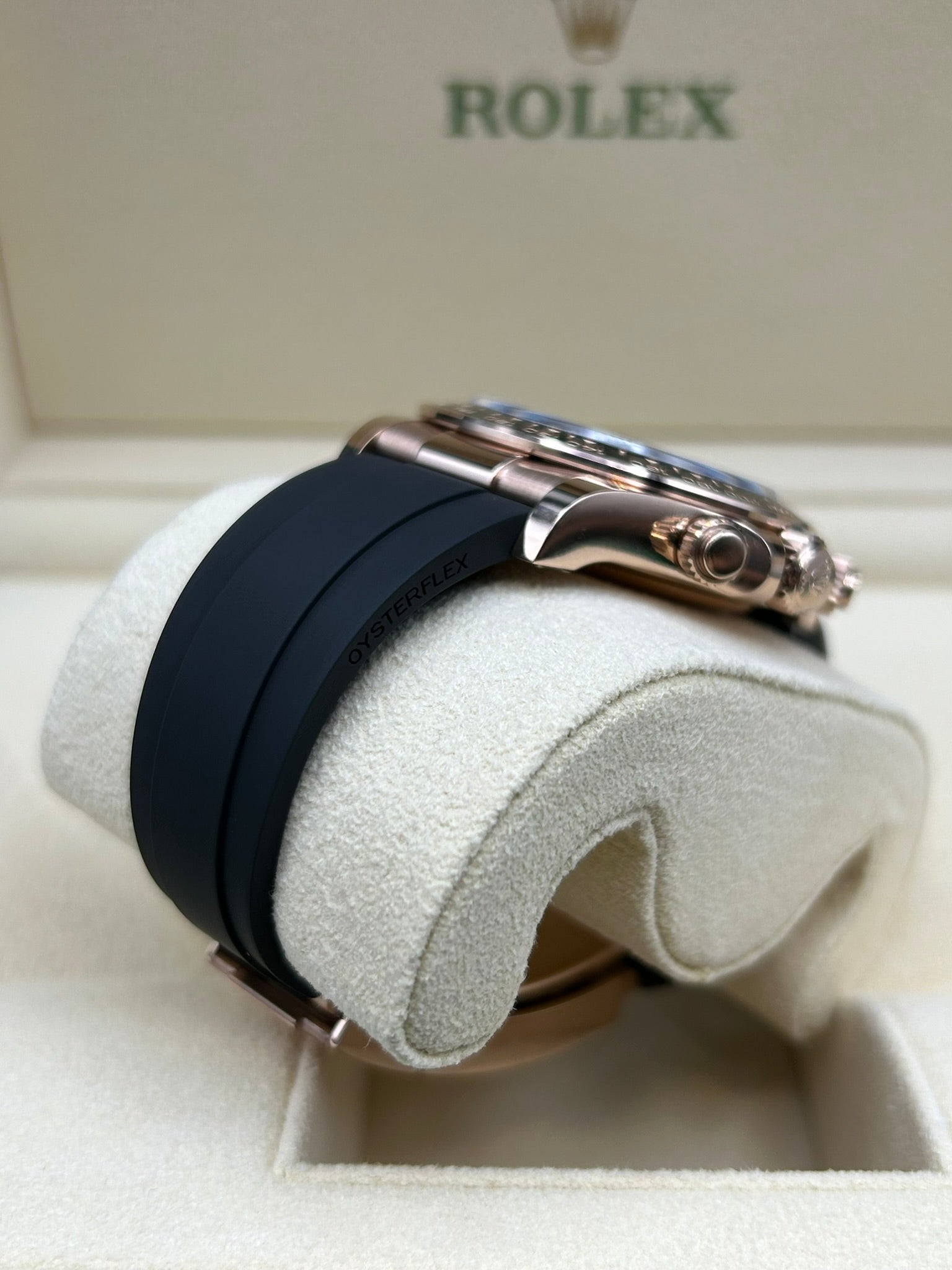 Rose gold chronograph watch with black dial
