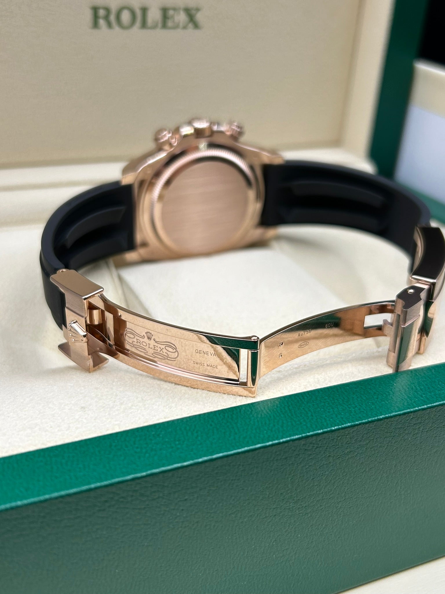 Black dial rose gold sport chronograph