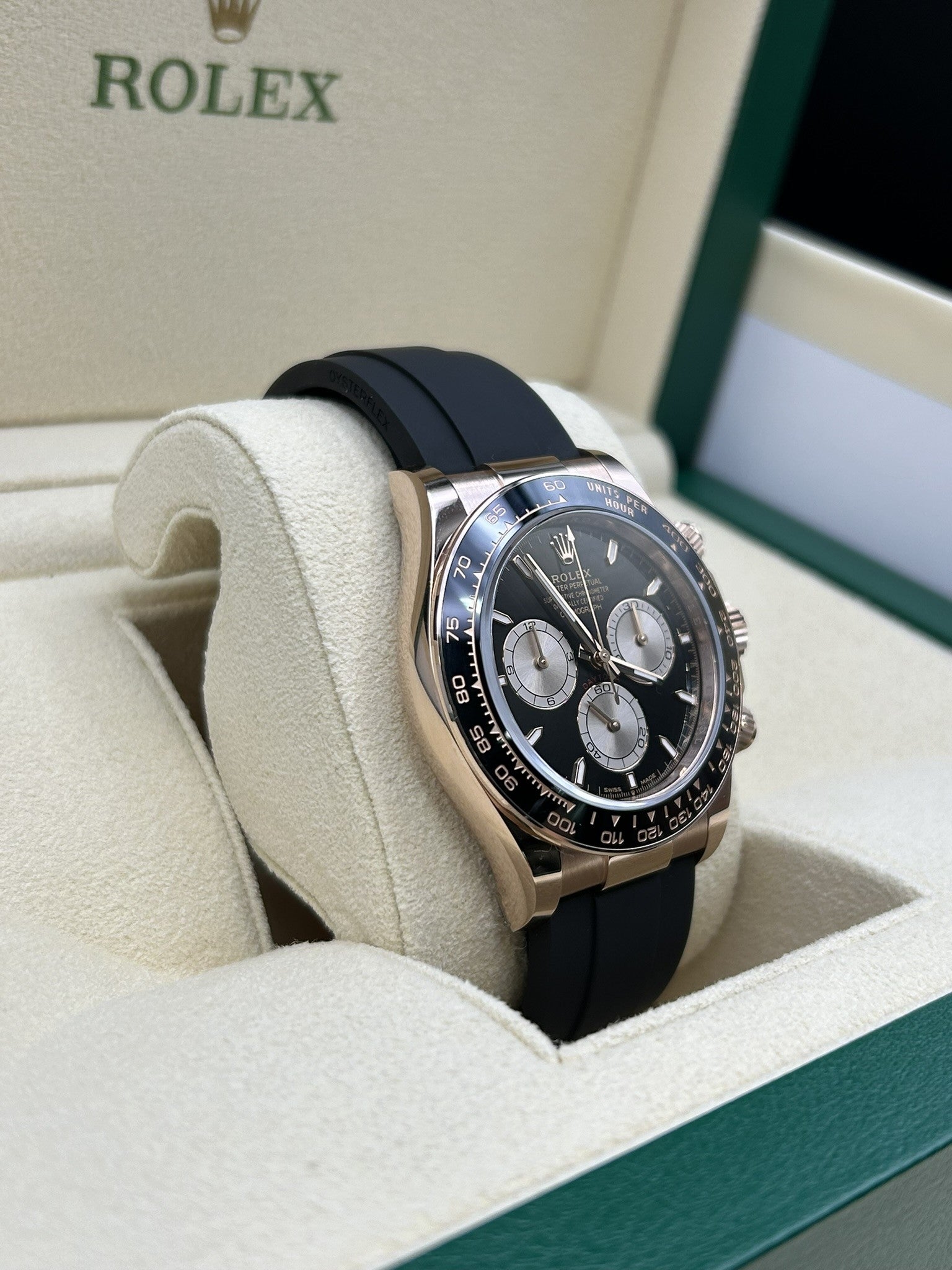 Rose gold chronograph watch with black dial