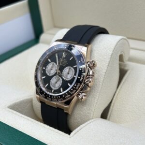 Rose gold watch with black chronograph dial