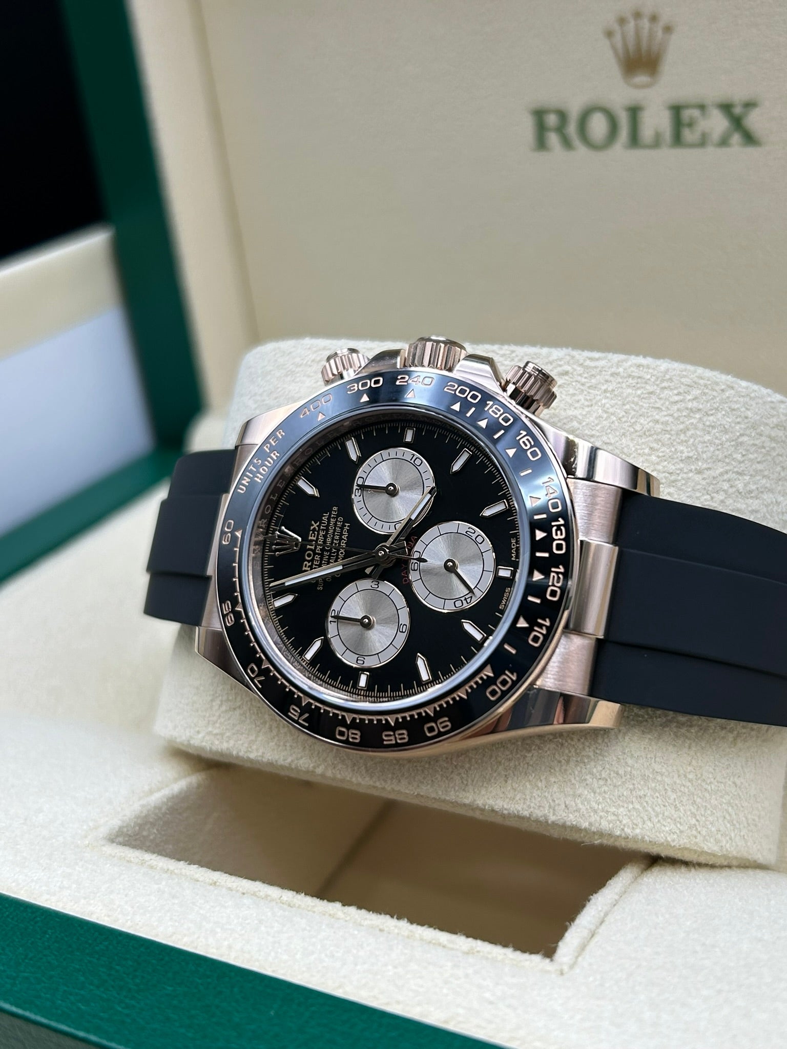 Rose gold chronograph watch with black dial