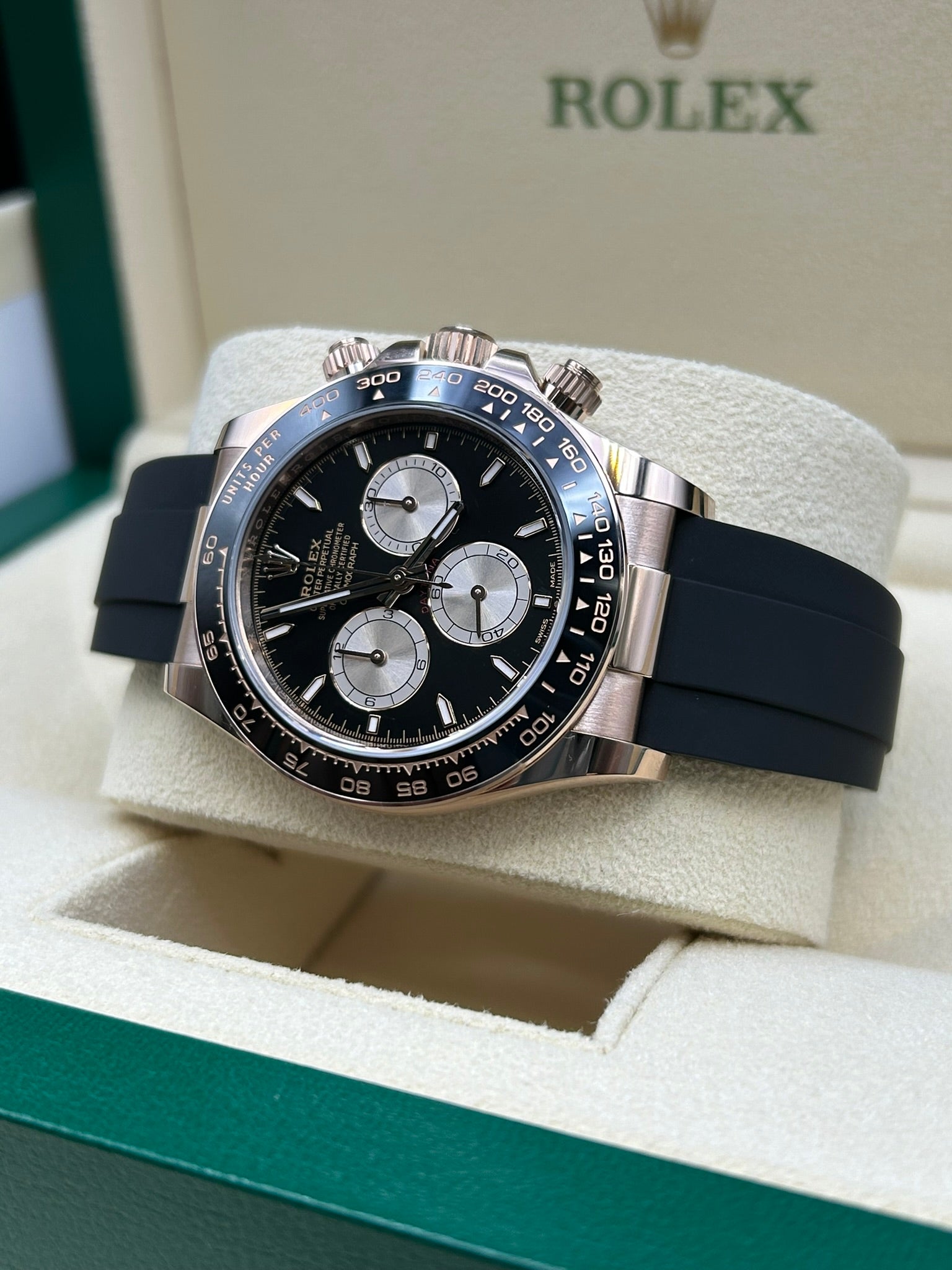 Black dial rose gold chronograph watch close-up