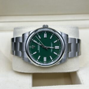 Luxury green dial wristwatch close-up