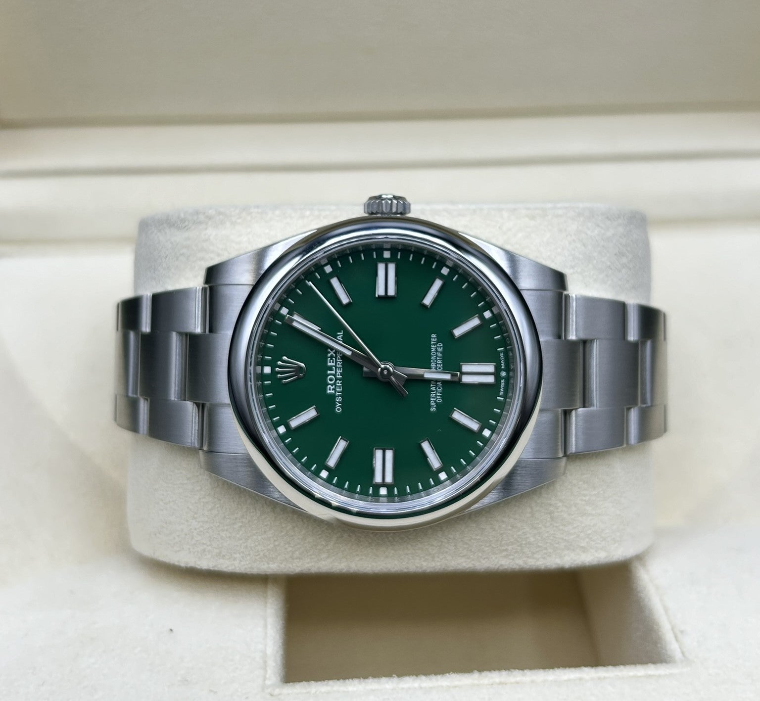Luxury green dial wristwatch close-up
