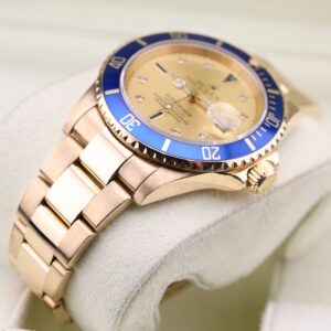 Yellow gold Rolex Submariner with champagne dial