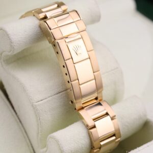 Rolex Submariner yellow gold watch close-up