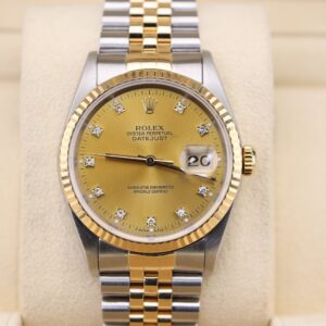 Pre-owned two-tone automatic watch with champagne dial
