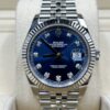 Blue dial luxury dress watch with diamond markers
