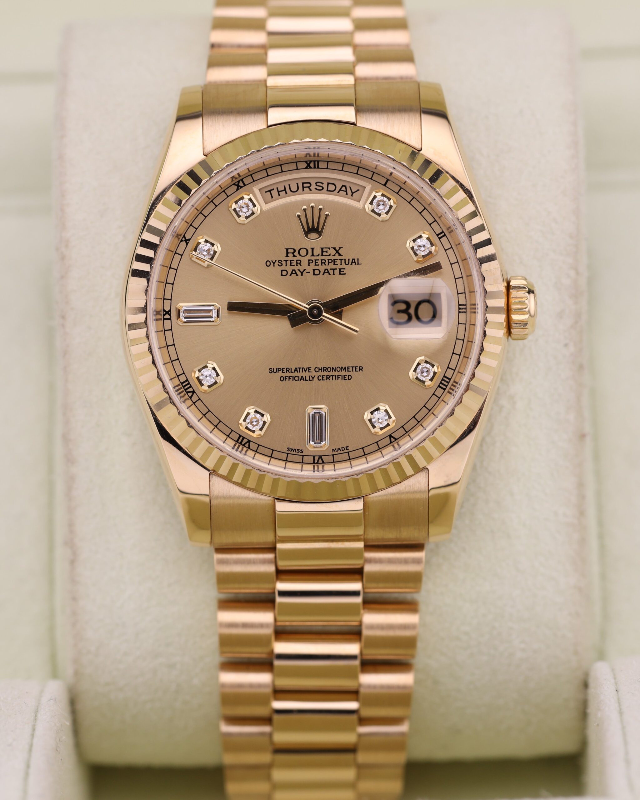 Gold watch with diamond dial