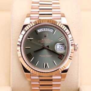 Rose gold watch with olive green dial
